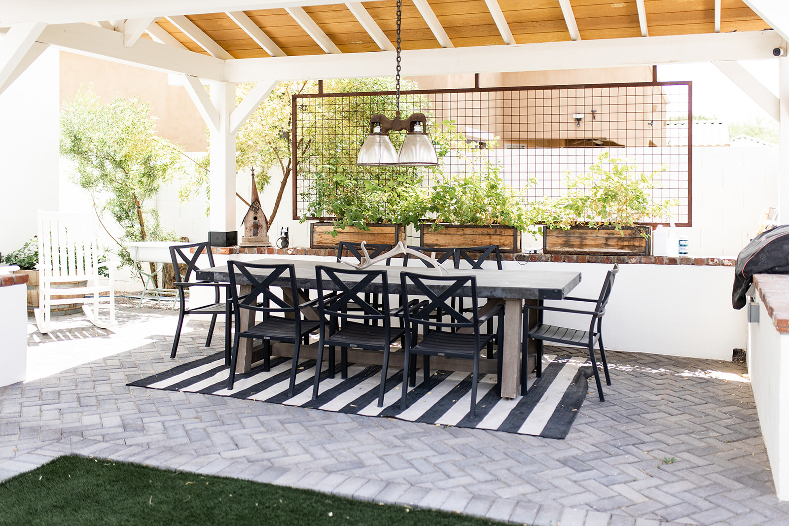 Covered patio dining area of an Arizona luxury home